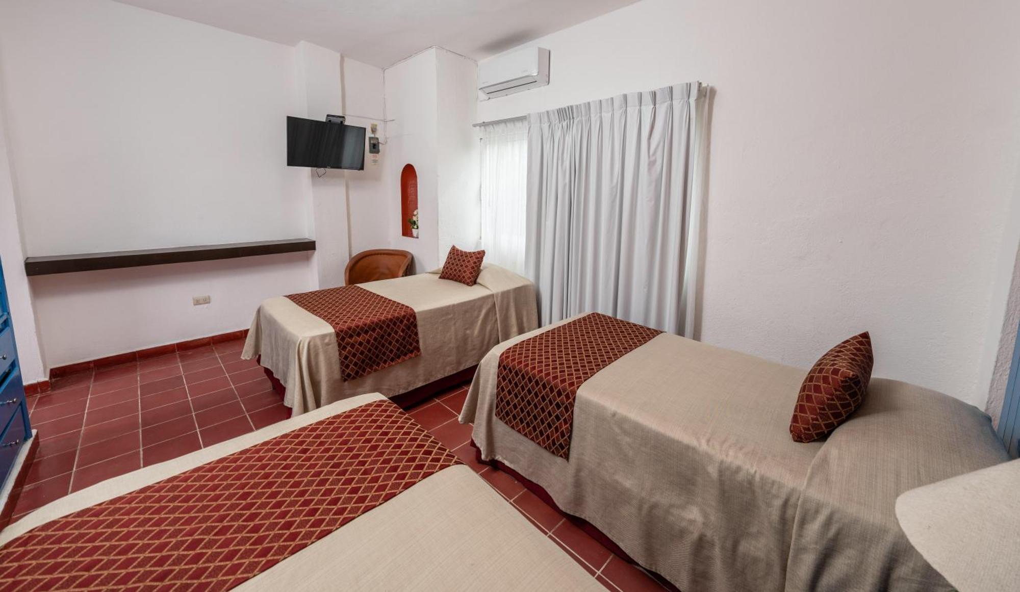 Hotel Encino Malecon Centro ปูแอร์โตบาญาร์ตา ห้อง รูปภาพ